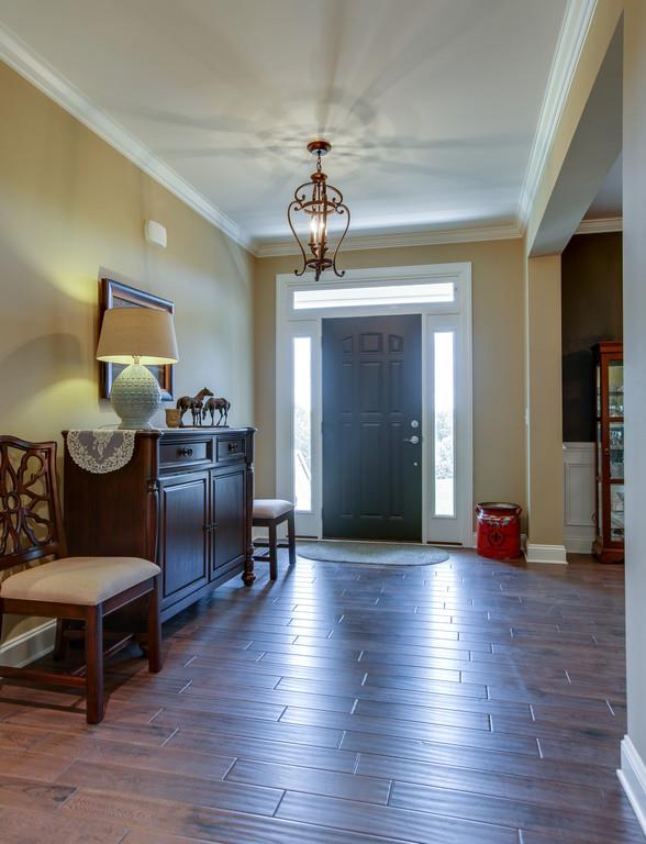 7901 Pinewood Road Fairview, TN 37062 - Photo 7 of 30 a living room with furniture and wooden floor