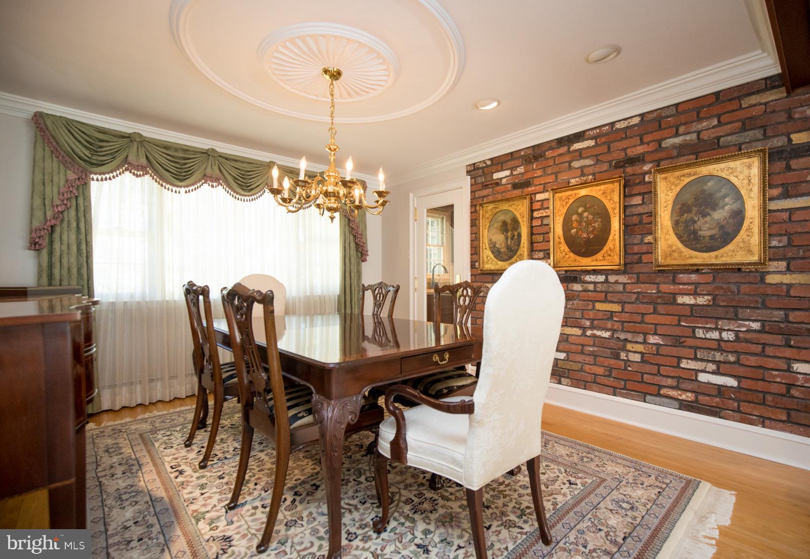 53 Pebble Ridge Road Warrington, PA 18976 - Photo 11 of 48 Dining Rm brick wall & Glass door to Kitchen