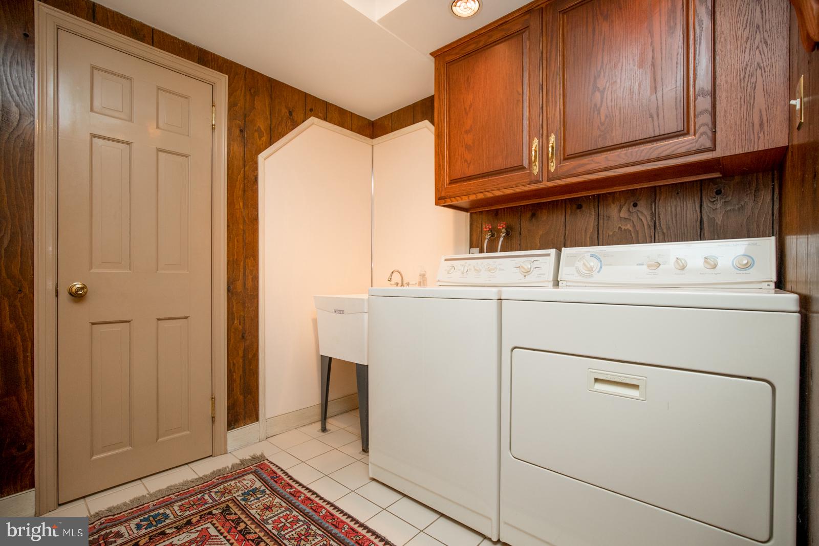 53 Pebble Ridge Road Warrington, PA 18976 - Photo 22 of 48 Laundry w/doors to Powder, Garage & Bsmt