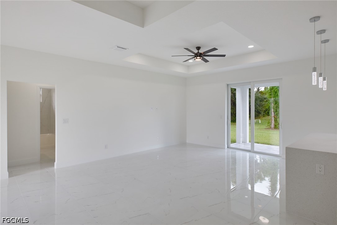 3000 3rd Street Southwest Lehigh Acres, FL 33976 - Photo 5 of 24 a view of an empty room with a window