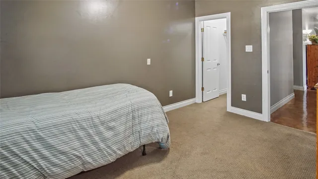 a view of empty room with closet