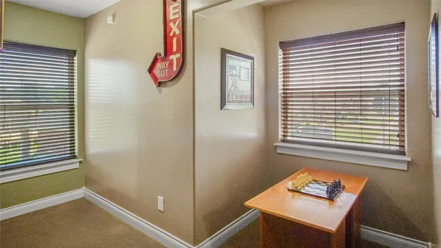 a room with a table and a window