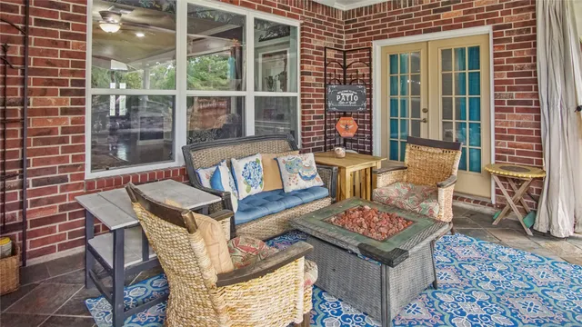 a outdoor living space with furniture and a potted plant