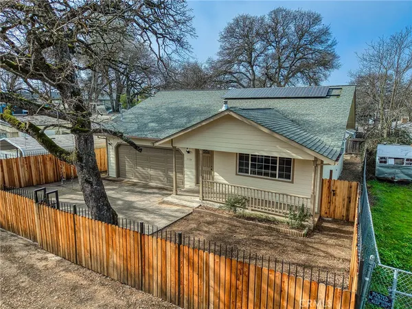 a backyard of a house with seating space