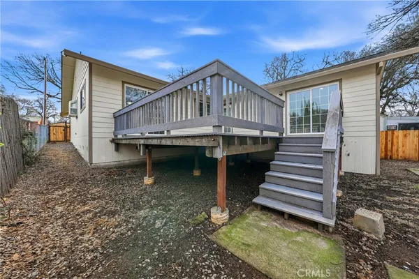 a view of a backyard of the house