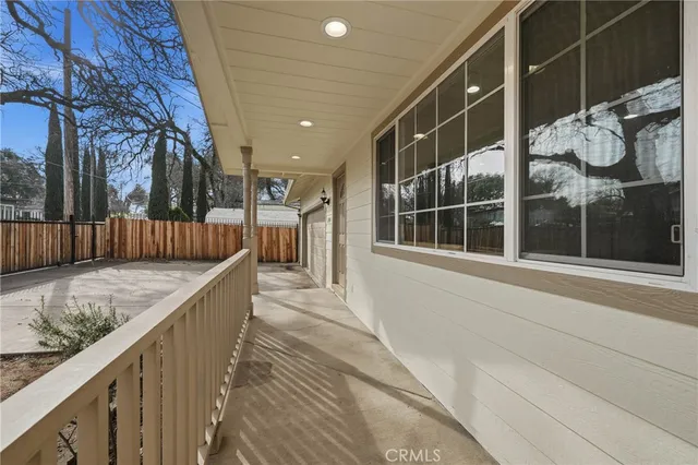 a view of outdoor space with wooden fence
