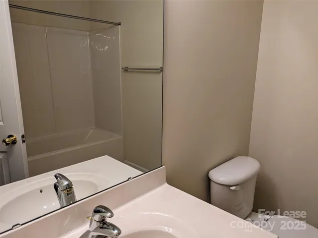 a bathroom with a sink and a toilet