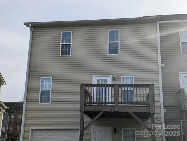 a view of a house with deck and deck