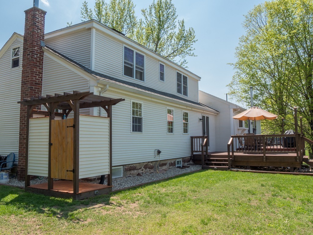 32 Old County Road Southampton, MA 01073 - Photo 6 of 23 a view of a house with a yard and sitting area