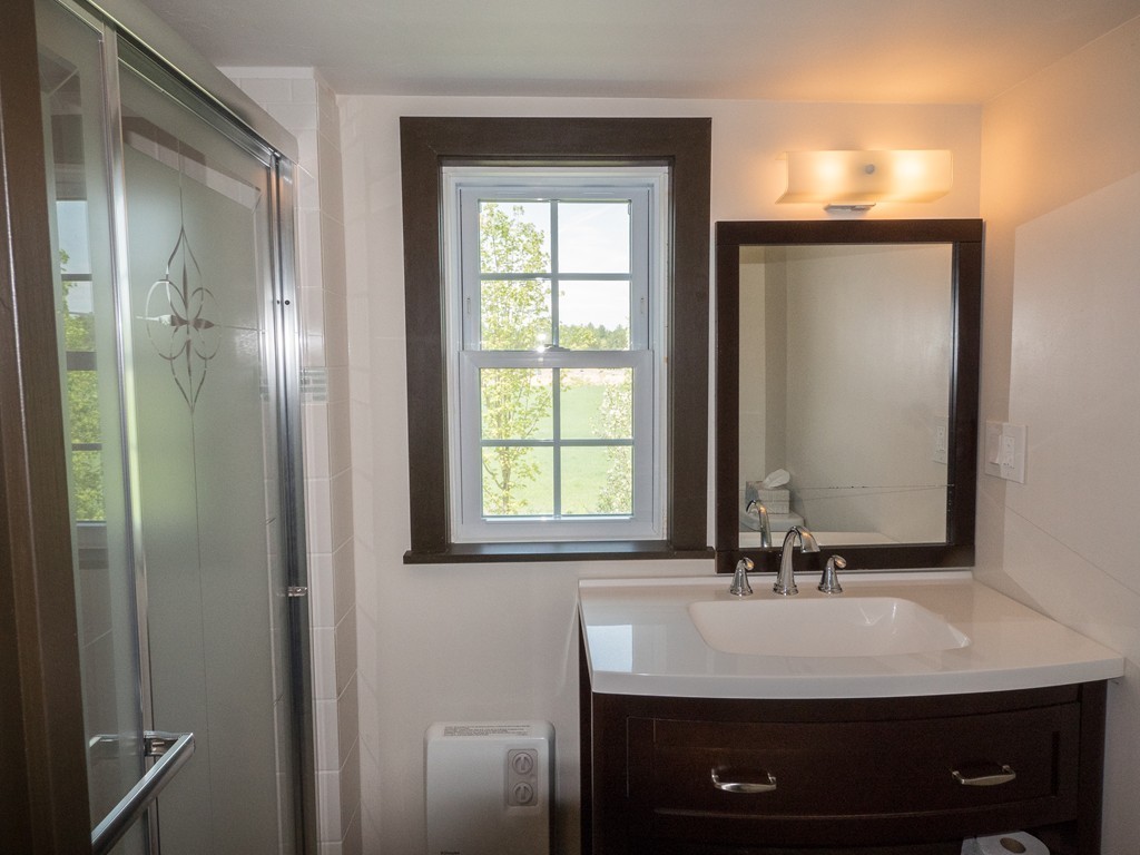 32 Old County Road Southampton, MA 01073 - Photo 7 of 23 a bathroom with a sink and a mirror
