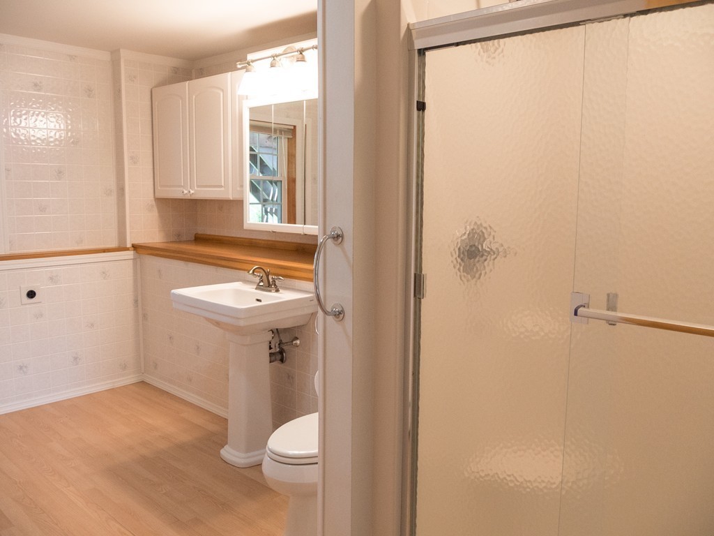 32 Old County Road Southampton, MA 01073 - Photo 8 of 23 a bathroom with a sink and a mirror