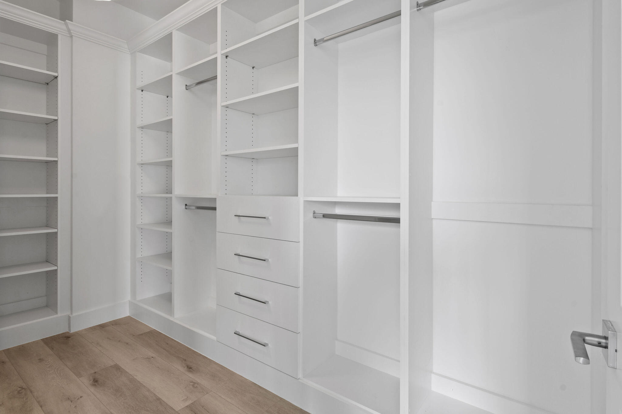 4707 Southeast Manatee Terrace Stuart, FL 34997 - Photo 27 of 68 a view of walk in closet with empty racks