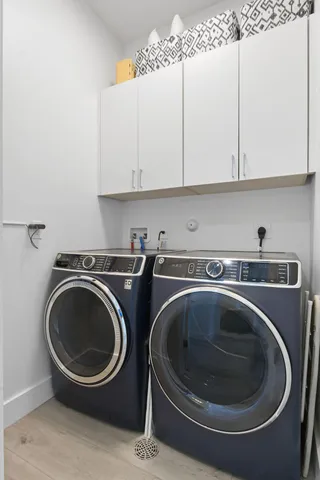 an aerial view of a house with a lake view