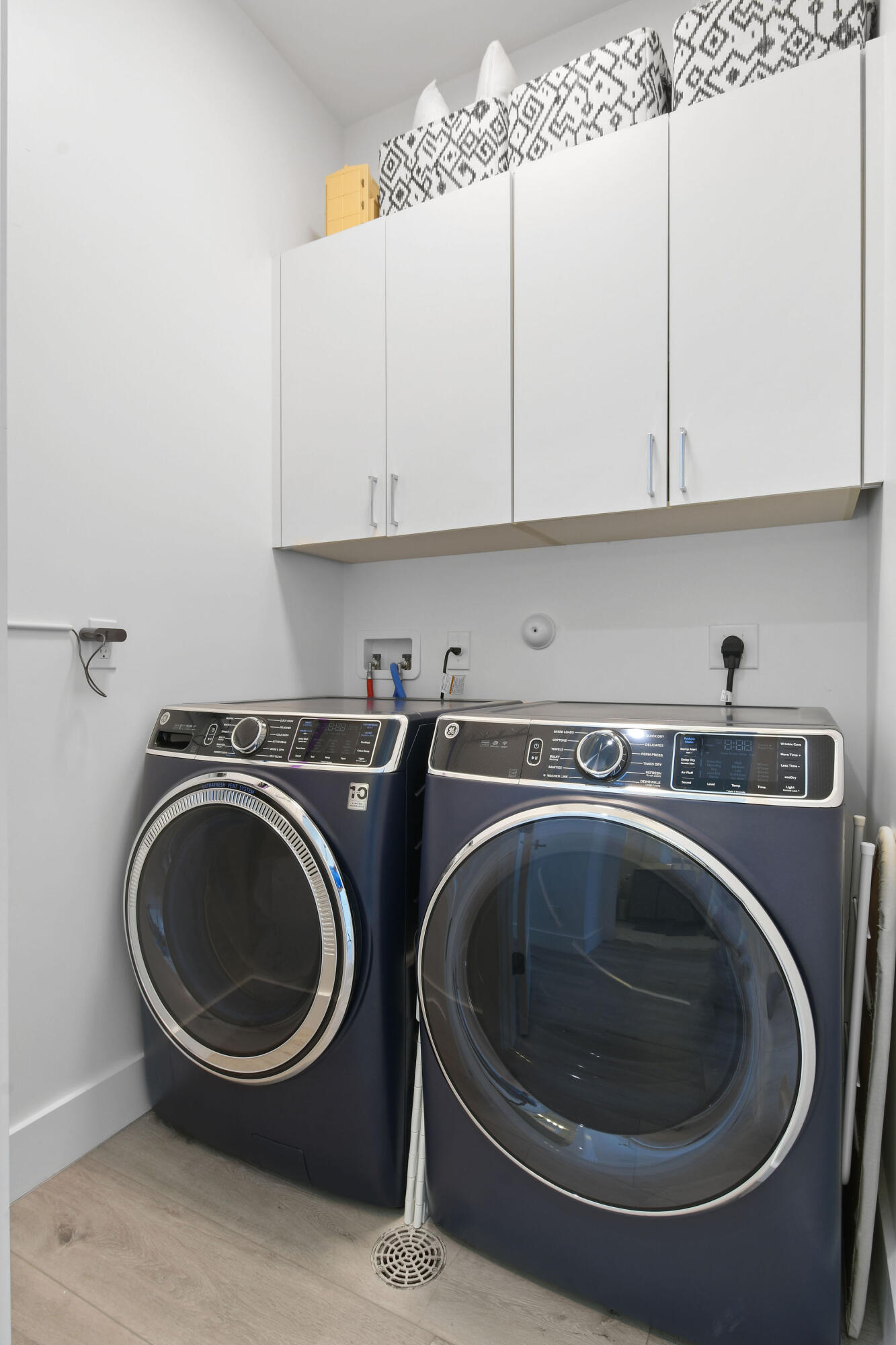 4707 Southeast Manatee Terrace Stuart, FL 34997 - Photo 43 of 68 a utility room with dryer and washer