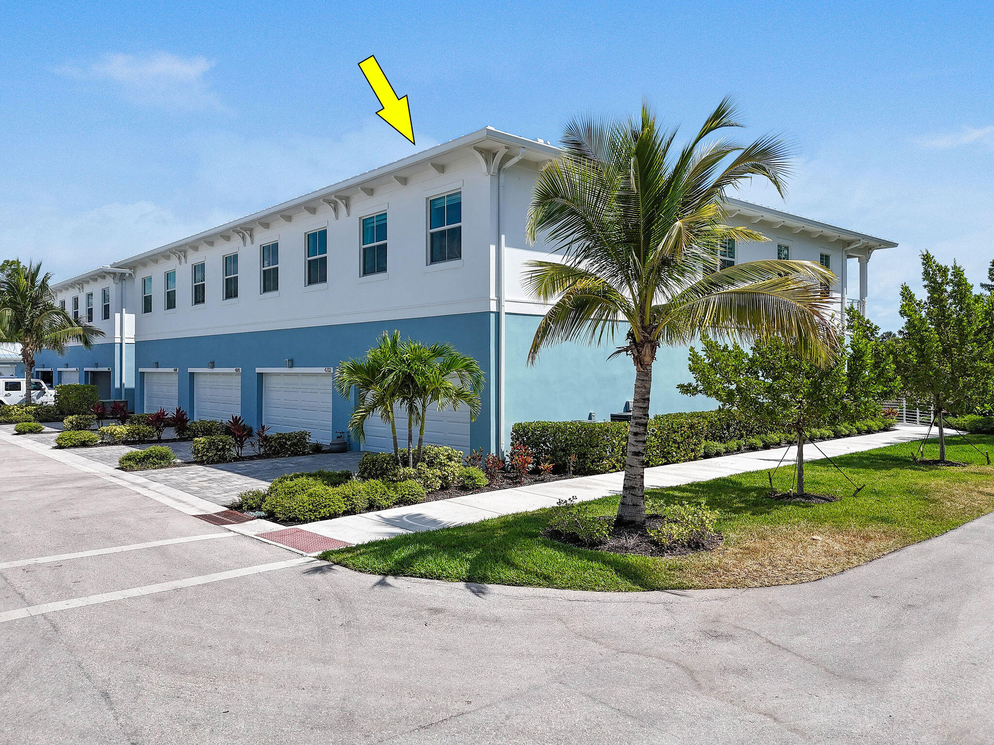 4707 Southeast Manatee Terrace Stuart, FL 34997 - Photo 51 of 68 a front view of house with yard and green space