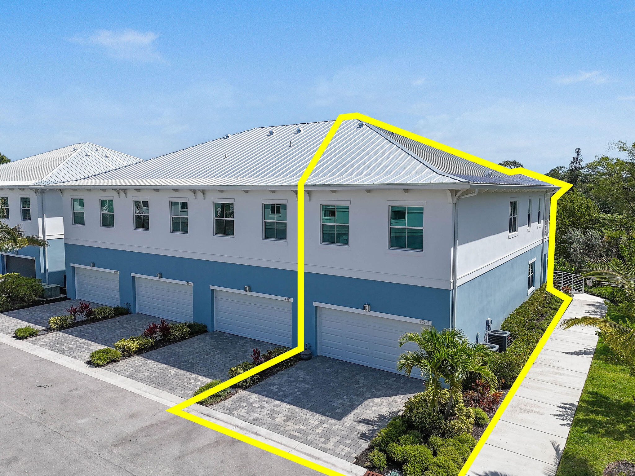 4707 Southeast Manatee Terrace Stuart, FL 34997 - Photo 53 of 68 a front view of a house with a yard