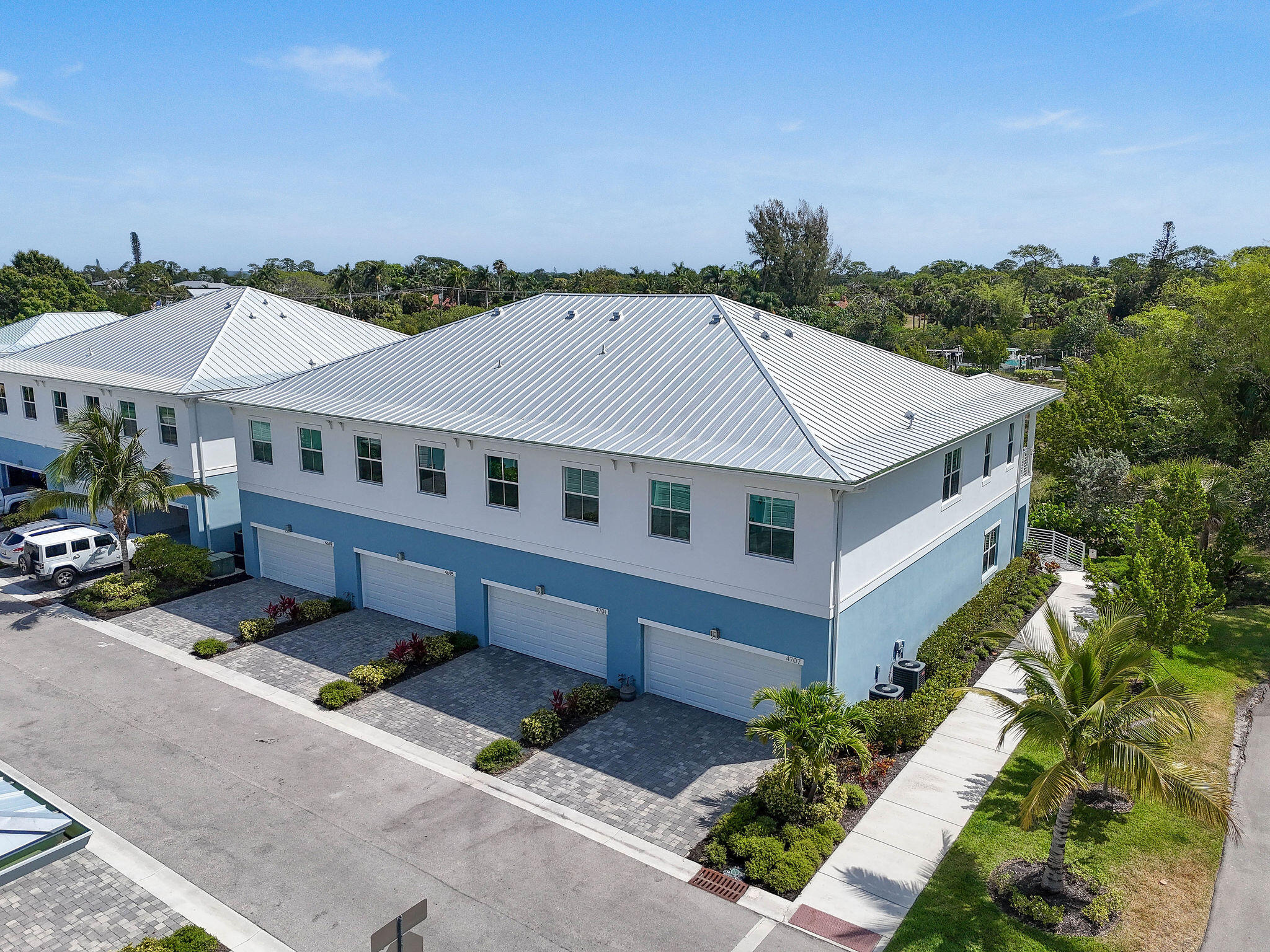 4707 Southeast Manatee Terrace Stuart, FL 34997 - Photo 54 of 68 an aerial view of a house with a yard