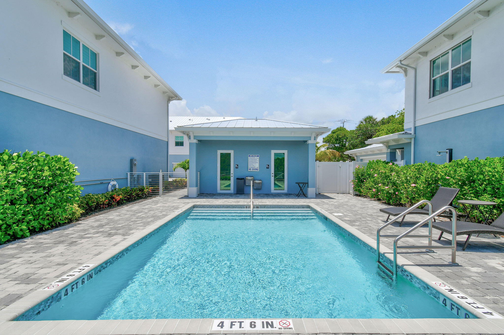 4707 Southeast Manatee Terrace Stuart, FL 34997 - Photo 66 of 68 a house view with a garden space