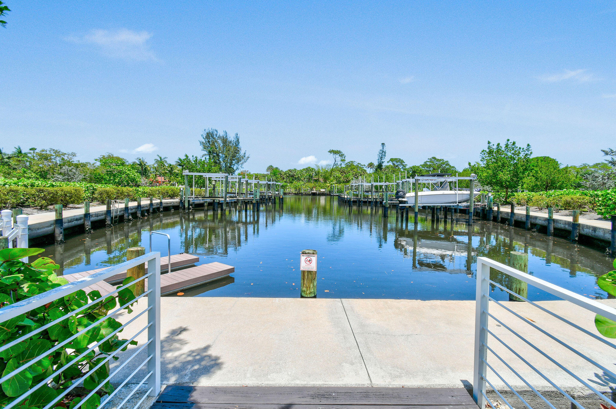 4707 Southeast Manatee Terrace Stuart, FL 34997 - Photo 67 of 68 a view of a lake with houses in outdoor space