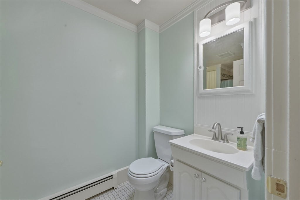 90 Rounsevell Road Tewksbury, MA 01876 - Photo 19 of 42 a bathroom with a sink and a toilet
