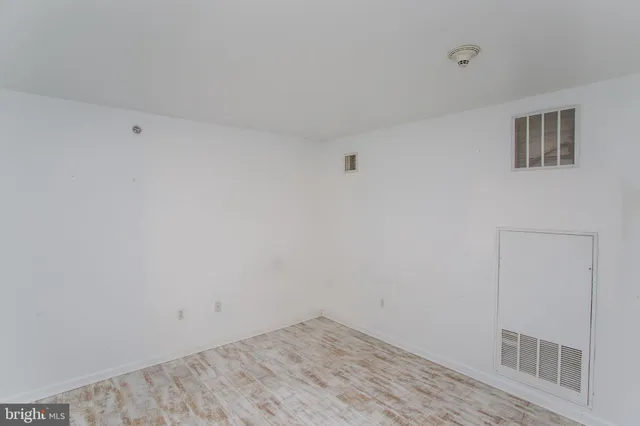 a kitchen with stainless steel appliances granite countertop a refrigerator and a stove