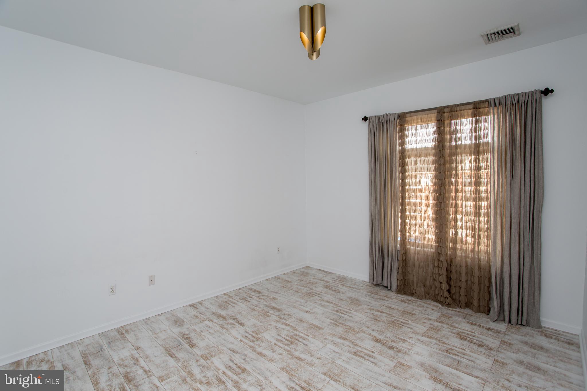 523 Carson Terrace Huntingdon Valley, PA 19006 - Photo 42 of 55 an empty room with windows