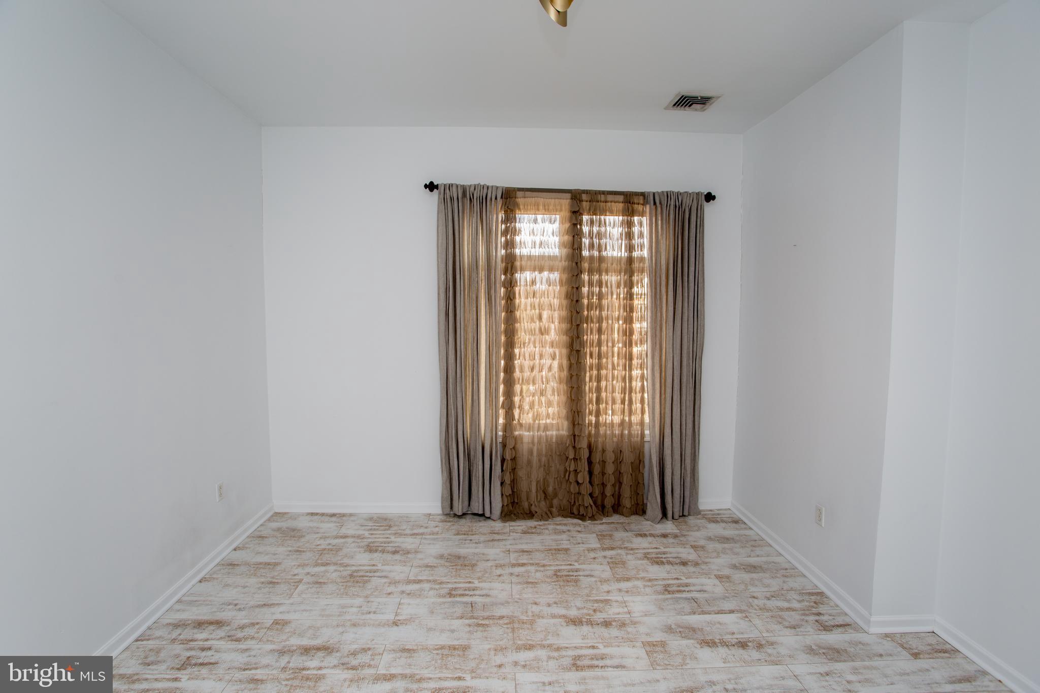 523 Carson Terrace Huntingdon Valley, PA 19006 - Photo 43 of 55 an empty room with windows