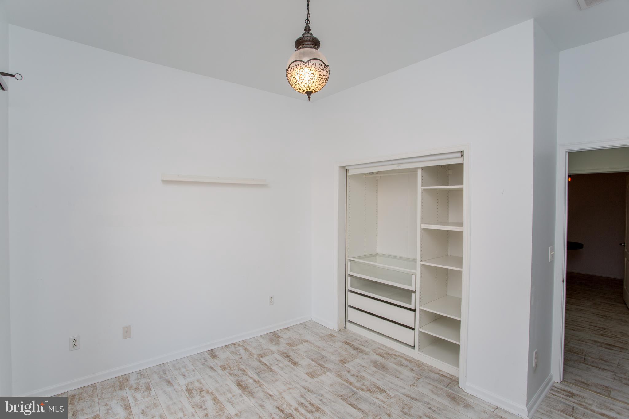 523 Carson Terrace Huntingdon Valley, PA 19006 - Photo 55 of 55 a view of an empty room and wooden floor