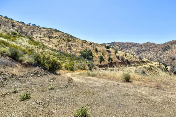 a view of a lake with a mountain in the background