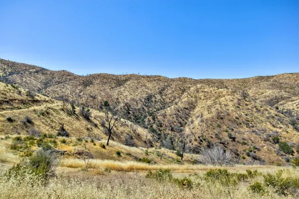 a view of a outdoor space with mountain view