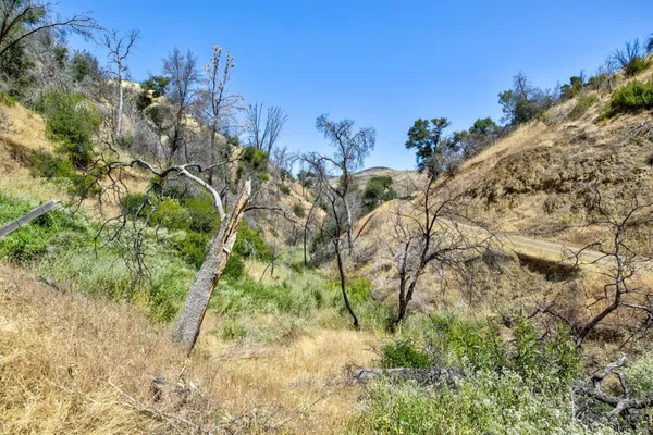 a view of a lake with a mountain in the background