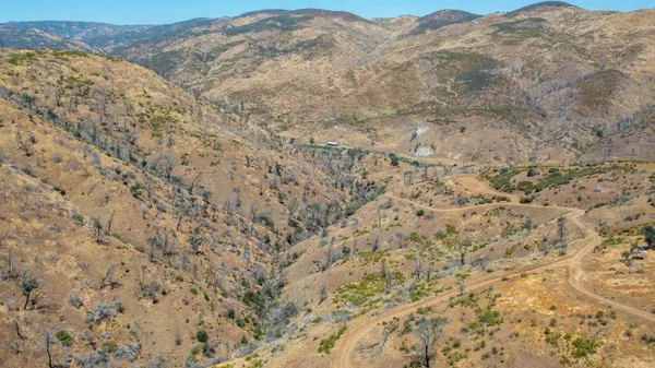 a view of mountain view with mountains in the background