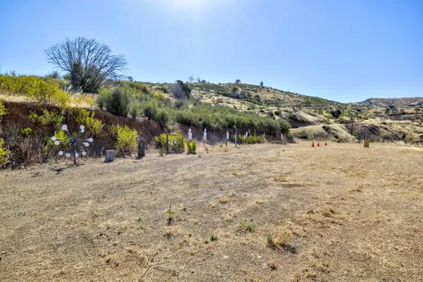 a view of a street with a building in the background