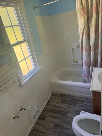 a bathroom with a sink and bathtub
