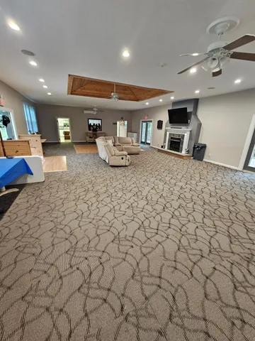a living room with a couch and a flat screen tv