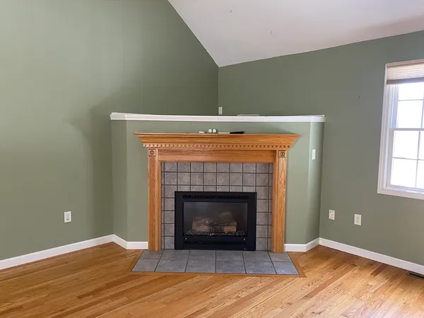 a living room with a fireplace