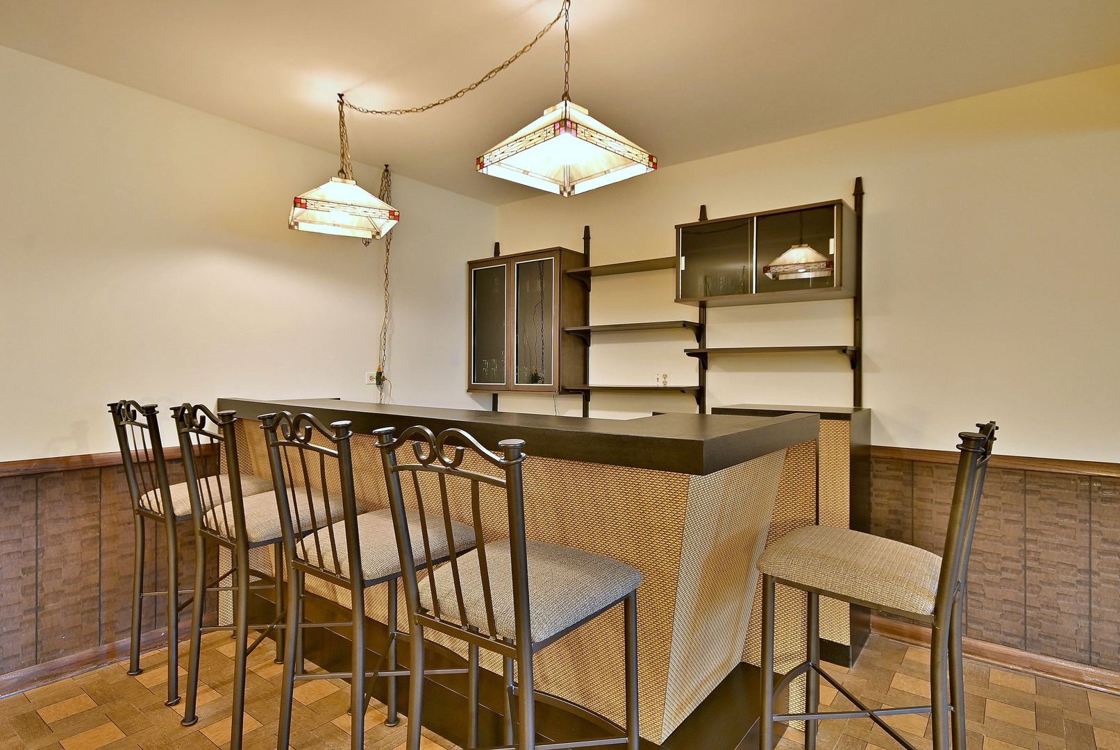 7976 Clarendon Hills Road Willowbrook, IL 60527 - Photo 17 of 41 a view of a dining room with furniture and chandelier