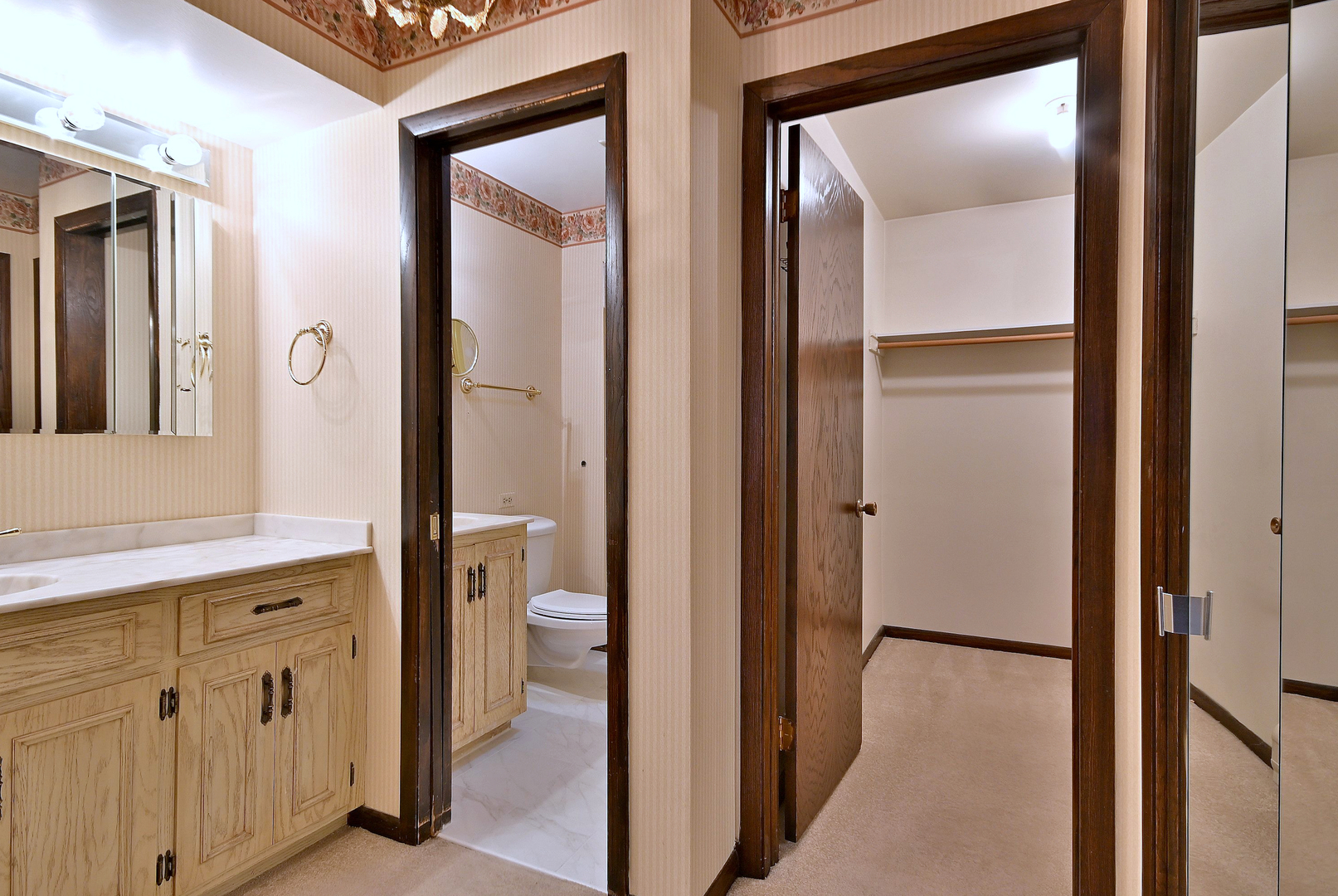 7976 Clarendon Hills Road Willowbrook, IL 60527 - Photo 25 of 41 a view of a bathroom from a hallway