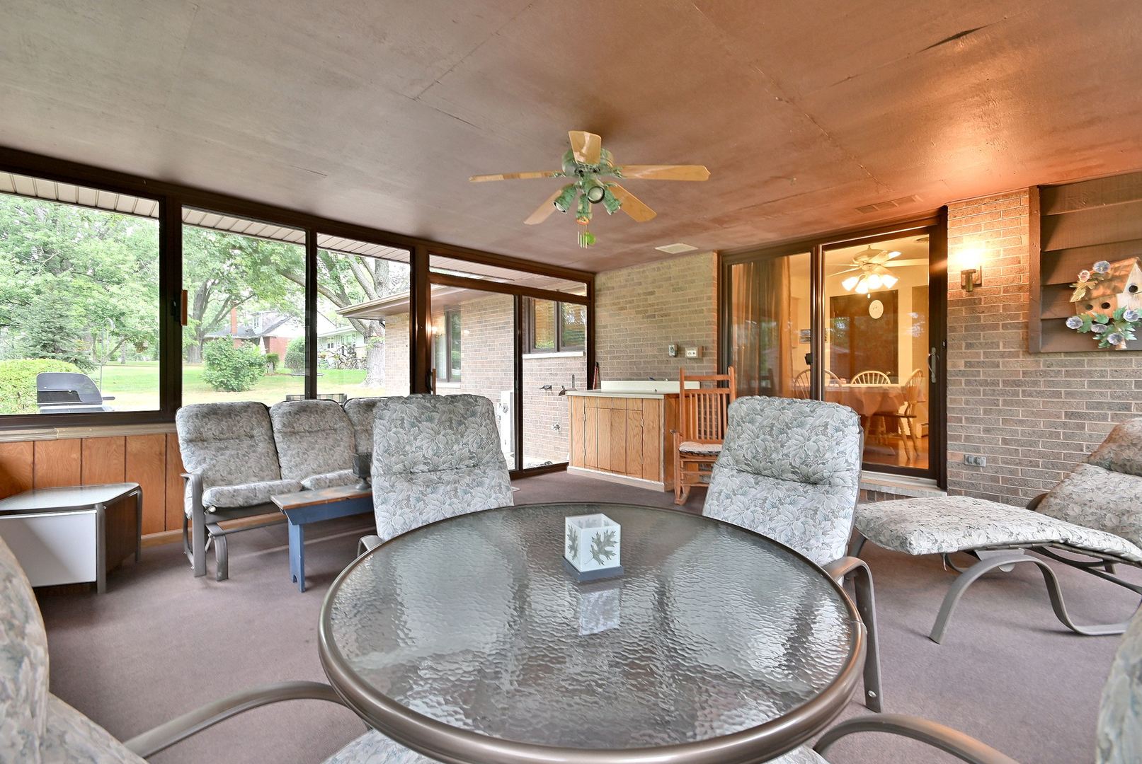 7976 Clarendon Hills Road Willowbrook, IL 60527 - Photo 30 of 41 a living room with furniture and a large window