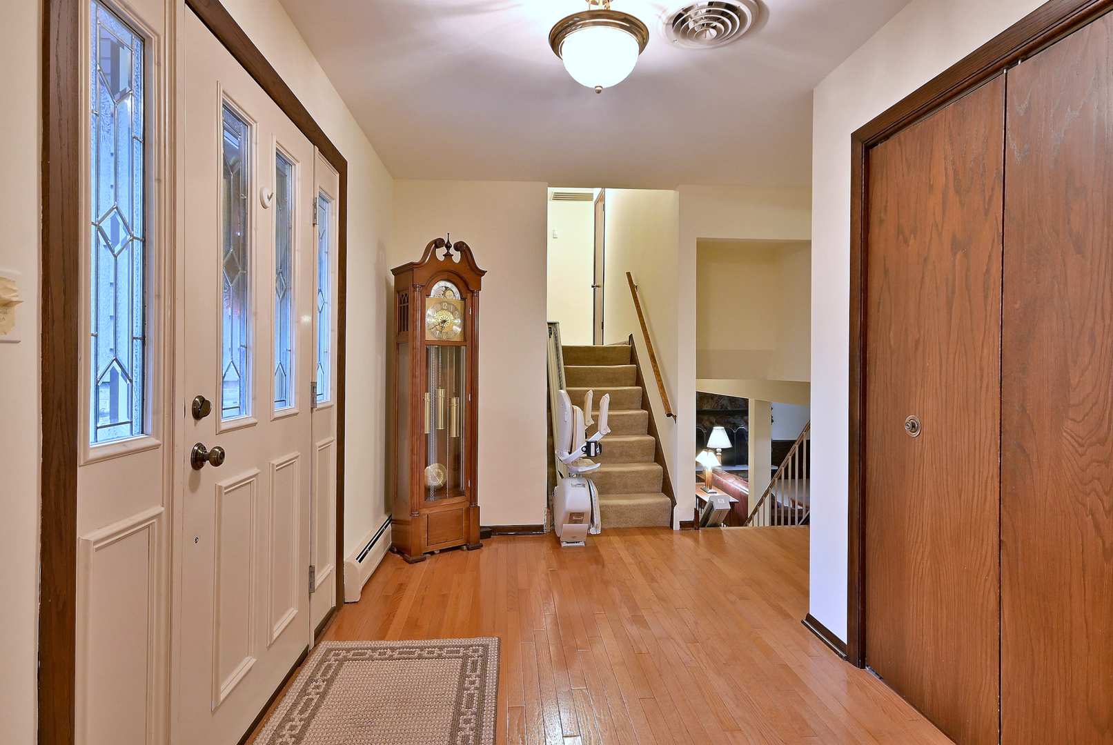 7976 Clarendon Hills Road Willowbrook, IL 60527 - Photo 4 of 41 a view of a house with wooden floor and windows