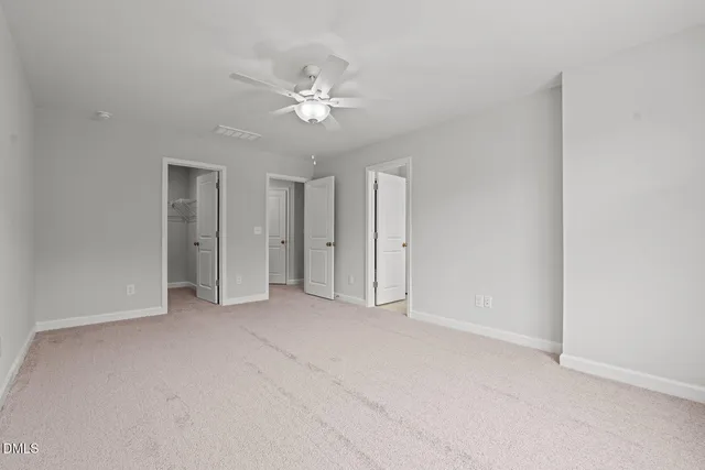 a view of a room with racks on the wall