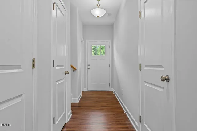 a view of a bathroom from the hallway