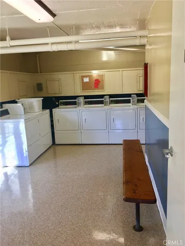 a view of a wooden deck and a yard