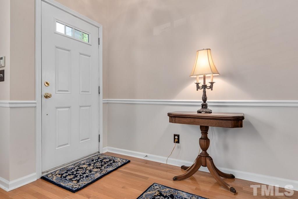 8348 City Loft Court Raleigh, NC 27613 - Photo 3 of 24 a view of a room with gym equipment