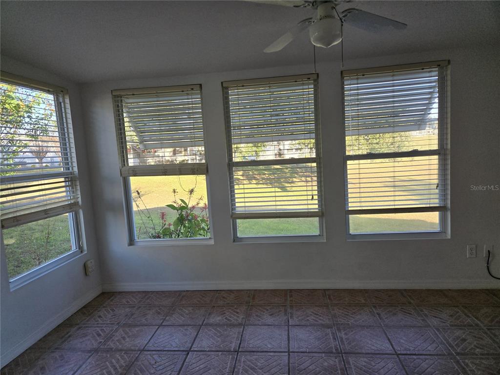 4146 Greenbluff Road, Unit 817 Zellwood, FL 32798 - Photo 35 of 40 a view of an empty room with a window