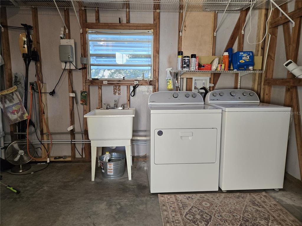 4146 Greenbluff Road, Unit 817 Zellwood, FL 32798 - Photo 38 of 40 a room with storage and utility