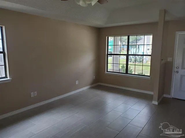 an empty room with windows