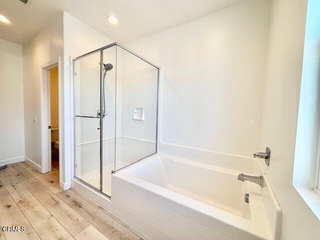 3640 Islander Walk Oxnard, CA 93035 - Photo 21 of 31 a bathroom with a bathtub and a shower