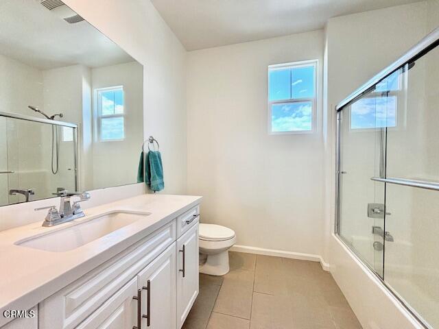 3640 Islander Walk Oxnard, CA 93035 - Photo 23 of 31 a bathroom with a sink a toilet and shower