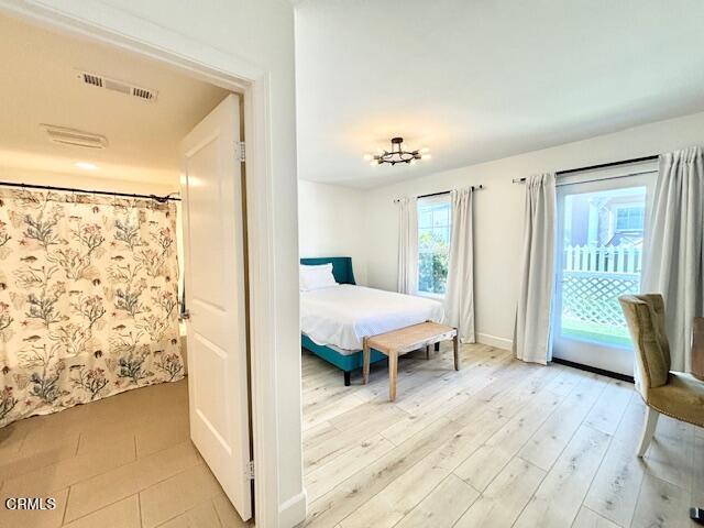 3640 Islander Walk Oxnard, CA 93035 - Photo 27 of 31 a spacious bathroom with a bathtub and shower